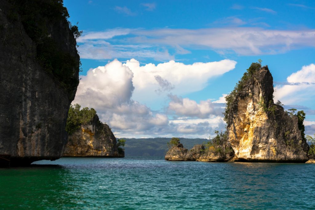 Rock formation in sea, Kabui Bay, Raja Ampat / Roy Singh / 500px via Lonely Planet