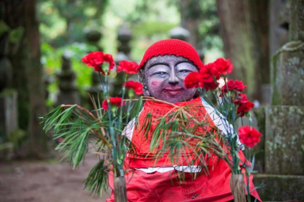 Buddhist monk statue in Okunoin Cemetery, Koyasan, Wakayama, Japan / Deposit Photos