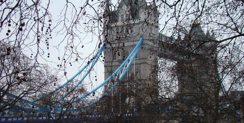 Tower Bridge under gloomy skies.