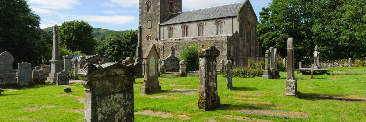 Kilmartin Church and graveyard in Scotland by Cornfield