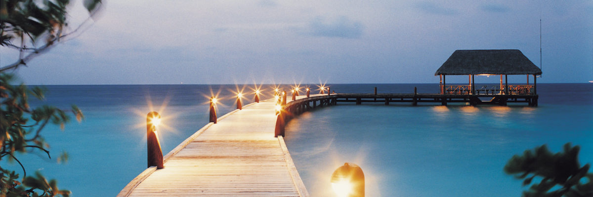 Arrival jetty at night, COMO Cocoa Island, Makunufushi, South Male Atoll, Maldives / COMO Hotels and Resorts