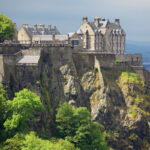 Edinburgh Castle on a hilltop as seen from a distance by konstantin 32