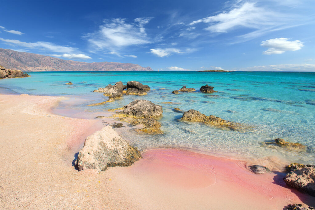 Pink sand and azure water at Elafonisi Beach on Crete by kwasny222