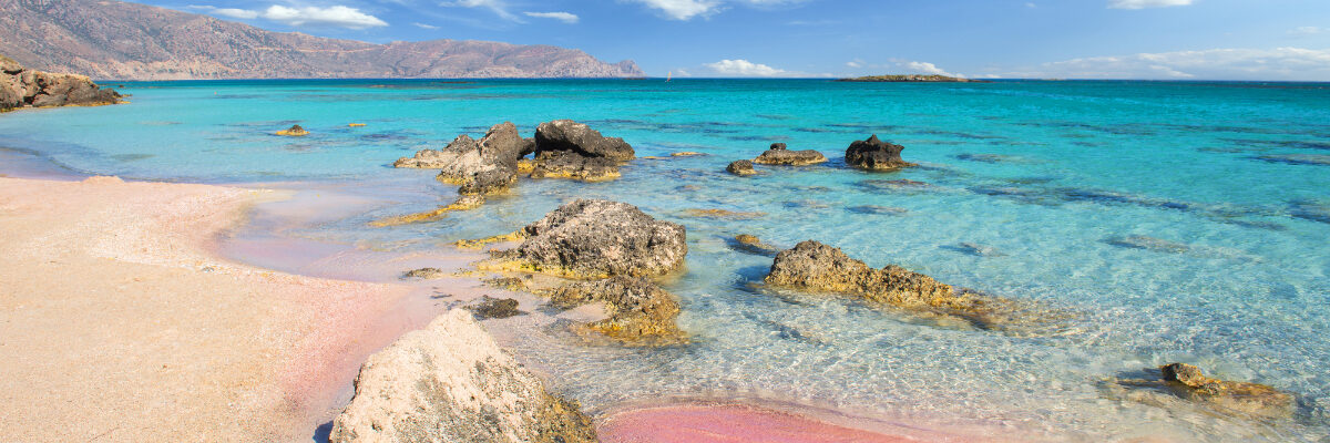 Pink sand and azure water at Elafonisi Beach on Crete by kwasny222